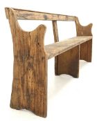 Early 20th century pine pew bench with shaped panel end supports W187cm