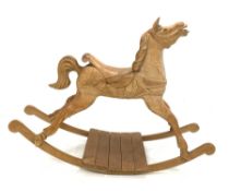 20th century Irish carved pine rocking horse