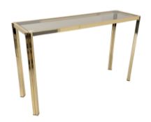Mid century Hollywood Regency brass console table with inset frosted glass top
