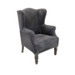 Early 20th century wing back armchair