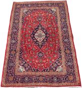 Persian Tabriz red ground rug