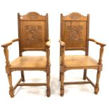 Pair of oak open armchairs