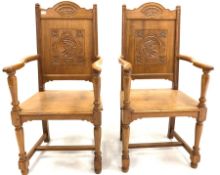 Pair of oak open armchairs
