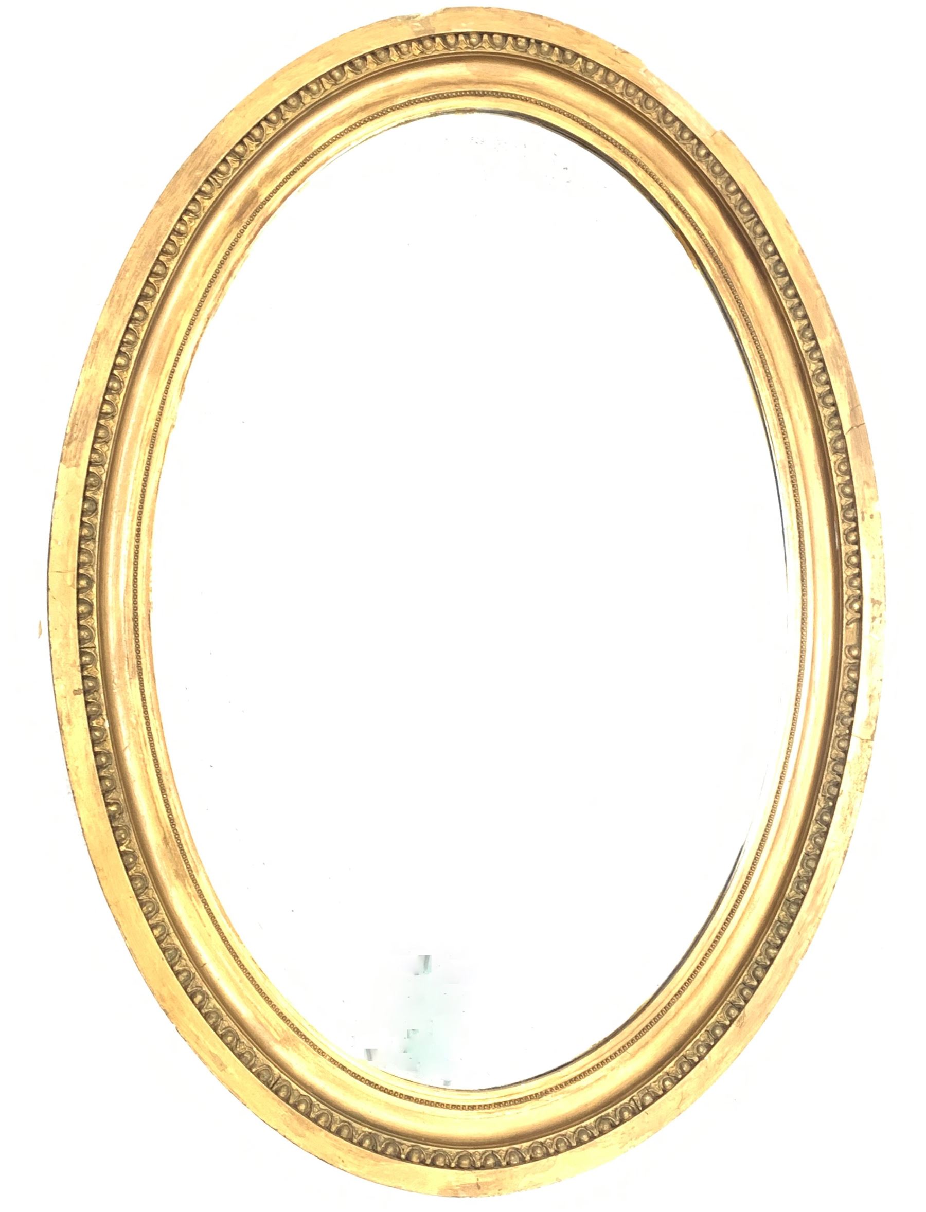 Victorian oval wall mirror in gilt frame with bevelled plate 64cm x 89cm