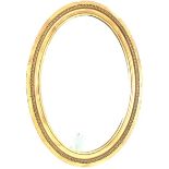 Victorian oval wall mirror in gilt frame with bevelled plate 64cm x 89cm