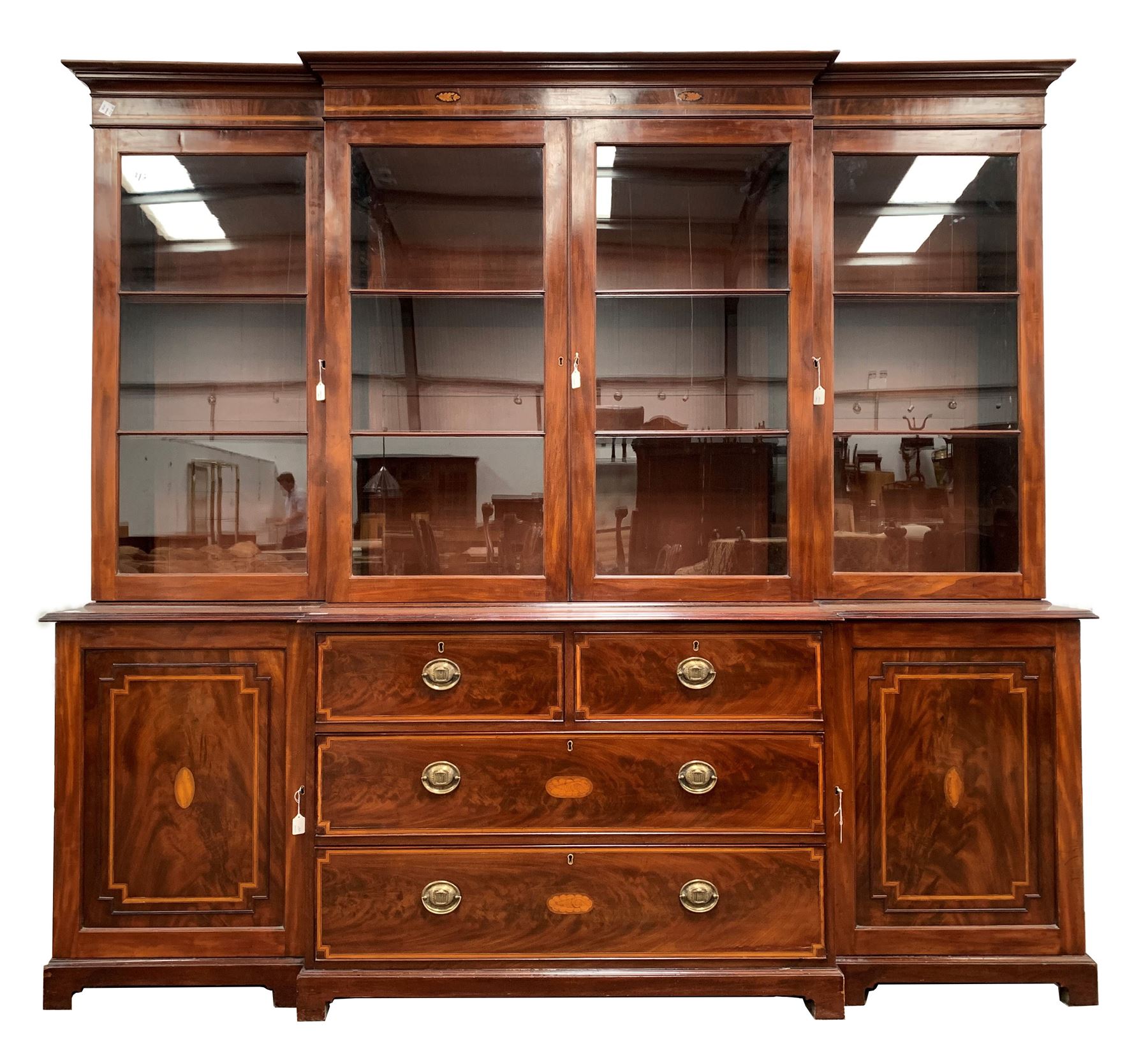 Large 20th century Sheraton design mahogany breakfront bookcase