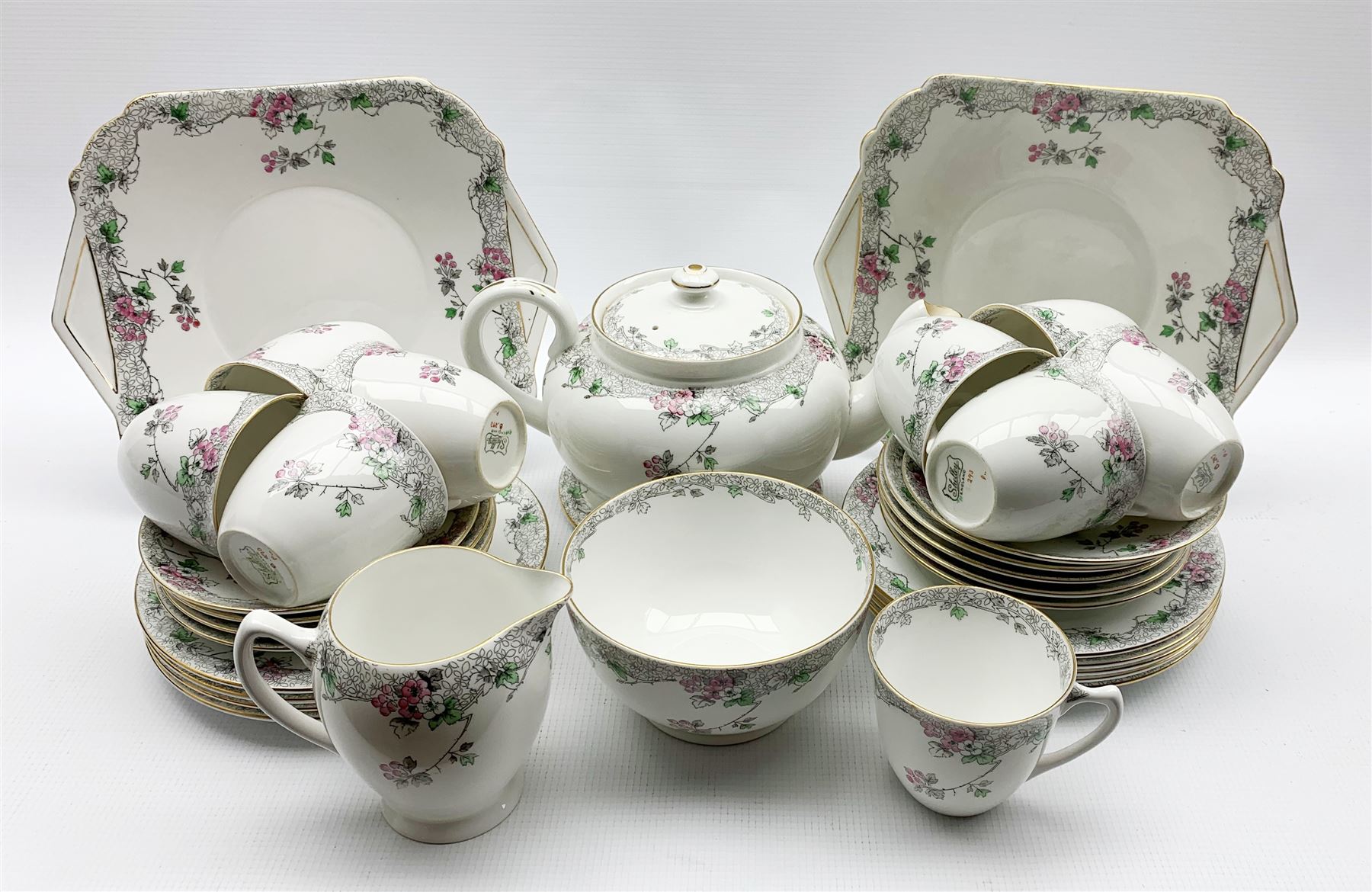 Shelley Bramble Rose pattern tea set comprising nine cups and saucers