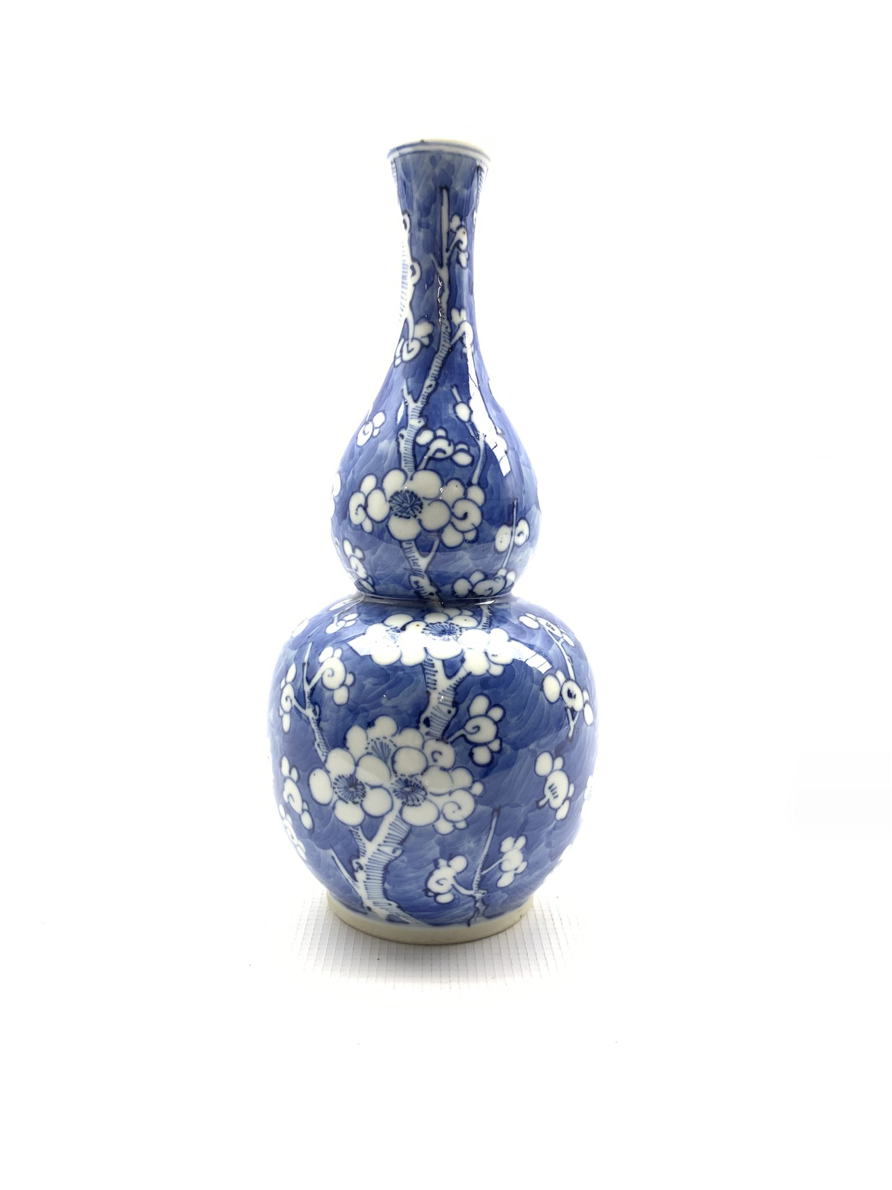 20th century Chinese gourd shape vase decorated with prunus in blue and white with four character ma - Image 2 of 3