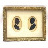 Harry Laurence Oakley (1882-1960) Pair of half length oval silhouette male and female portraits