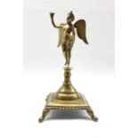 18th/19th Continental bronze candlestick in the form of a winged female figure on a square base and