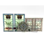 Pair of leaded stained glass window panels (68cm x 40cm) together with another pair of stained glass