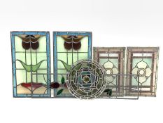 Pair of leaded stained glass window panels (68cm x 40cm) together with another pair of stained glass