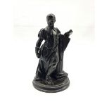 Patinated spelter model of a Scholar