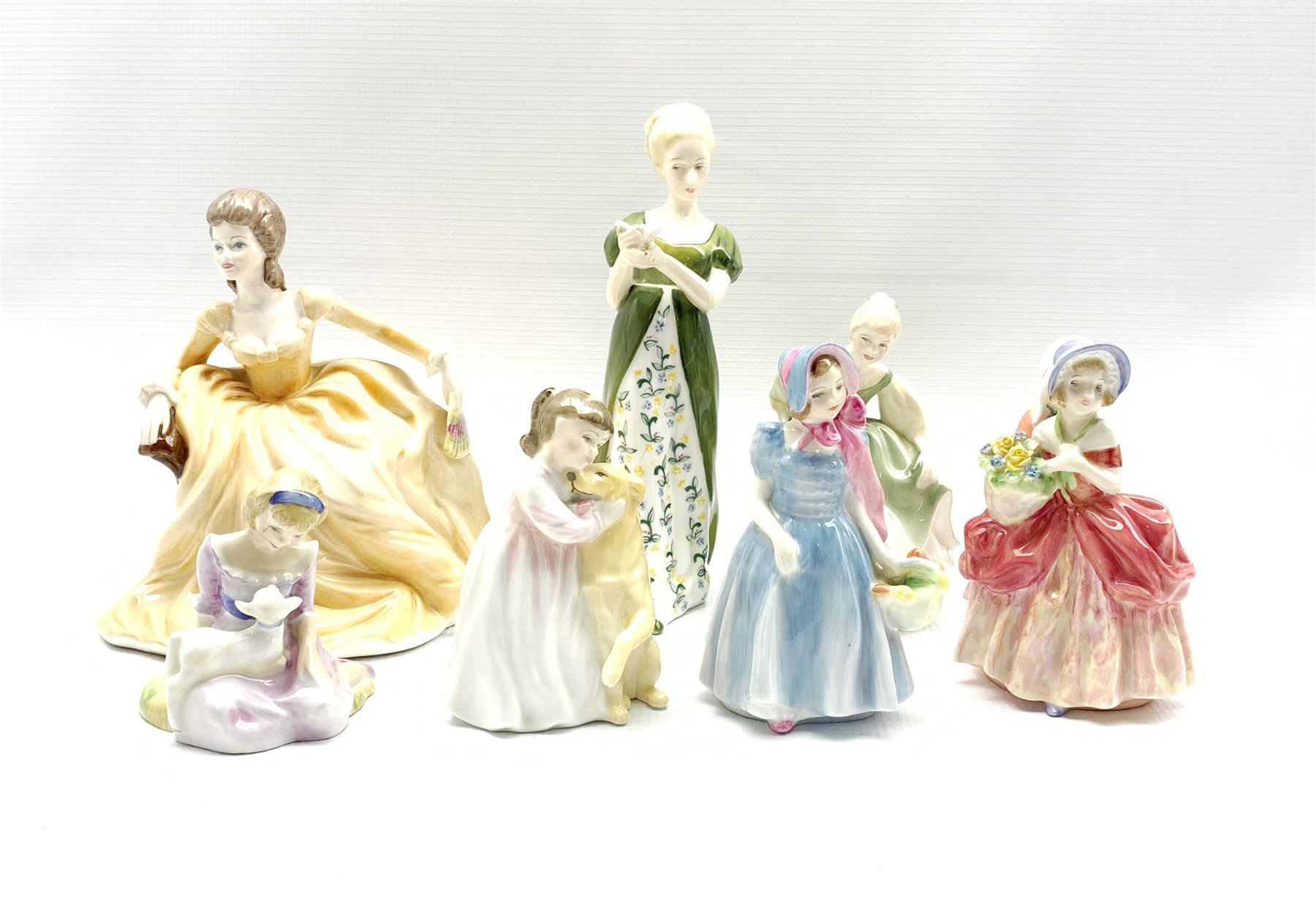 Seven Royal Doulton figures comprising Fair Maiden