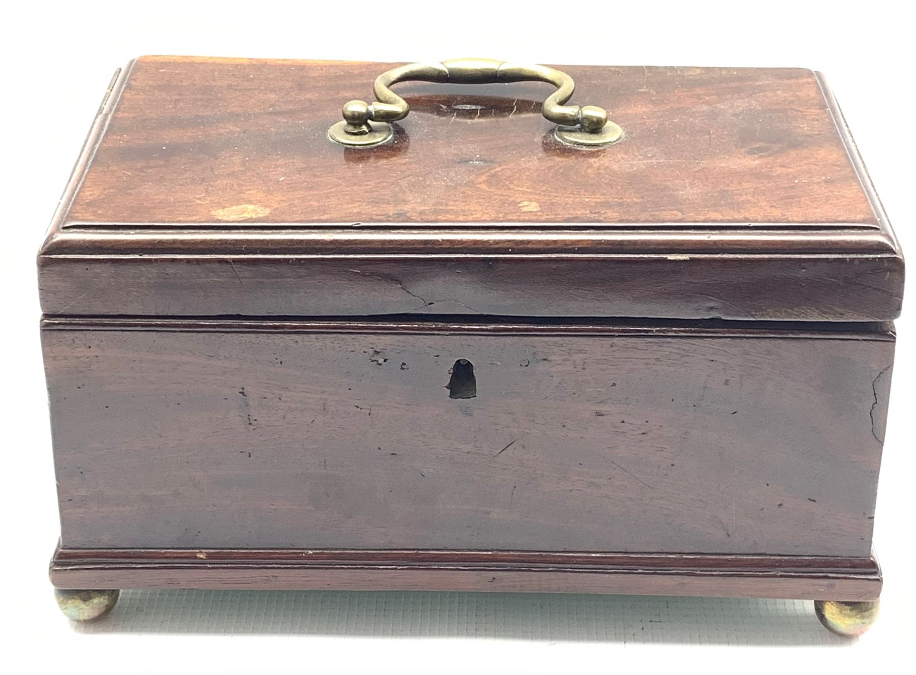 Early 19th century mahogany tea caddy with brass handle and ball feet W24cm