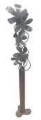 Large freestanding steel sculpture of a vase and flowers