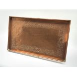 Keswick School of Industrial Arts rectangular galleried copper tray with a repousse band of trailing