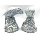 Pair of Bretby figures of parrots in a pale blue glaze H19cm