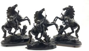 Pair of 19th century painted spelter Marley Horses on ebonised oval plinths