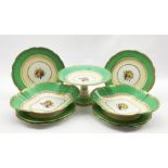 Aynsley dessert service painted with a centre panel of fruit within a green and gilt border comprisi