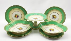 Aynsley dessert service painted with a centre panel of fruit within a green and gilt border comprisi