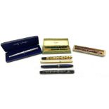 Burnham fountain pen with 14ct gold nib in marbled case with matching propelling pencil