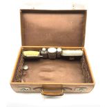 1920's travelling dressing case with fitted interior comprising three cut glass dressing table jars