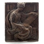 Plaster plaque with a seated female figure holding a scroll titled 'Fame'
