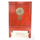 Late 19th century Chinese red lacquered Moon cabinet