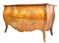 French Louis XV design commode of serpentine outline and with inlaid decoration