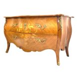 French Louis XV design commode of serpentine outline and with inlaid decoration