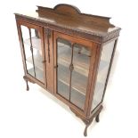 Early 20th century walnut display cabinet