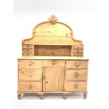 Victorian stripped pine dresser fitted with seven drawers and centre cupboard