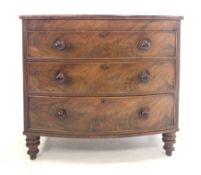 Victorian figured mahogany bow front chest fitted with three drawers