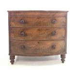 Victorian figured mahogany bow front chest fitted with three drawers