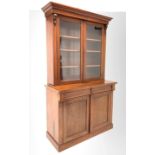 Victorian mahogany bookcase on cupboard