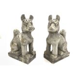 Pair of reconstituted stone garden statues in the form of oriental dogs H73cm