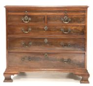 Georgian design mahogany chest with brushing slide over two short and three long drawers