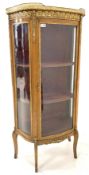 20th century French bow front vitrine