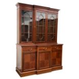 20th century Sheraton design mahogany breakfront bookcase