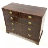 Georgian mahogany chest fitted with two short and three long graduated cock beaded drawers with plat