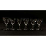 Set of six early 20th century cut glass drinking glasses of hexagonal form