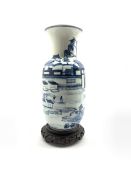 20th century Chinese blue and white vase decorated with a scene of figures in a courtyard setting