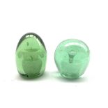 Two Victorian green glass dump paperweights