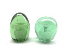 Two Victorian green glass dump paperweights