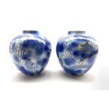 Pair of Chinese blue and white ginger jars painted with Dragons on splatter effect ground