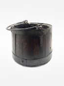 19th century coopered oak bucket of tapering form with swing handle