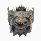 Eastern carved hardwood mask modelled as a mythical creature
