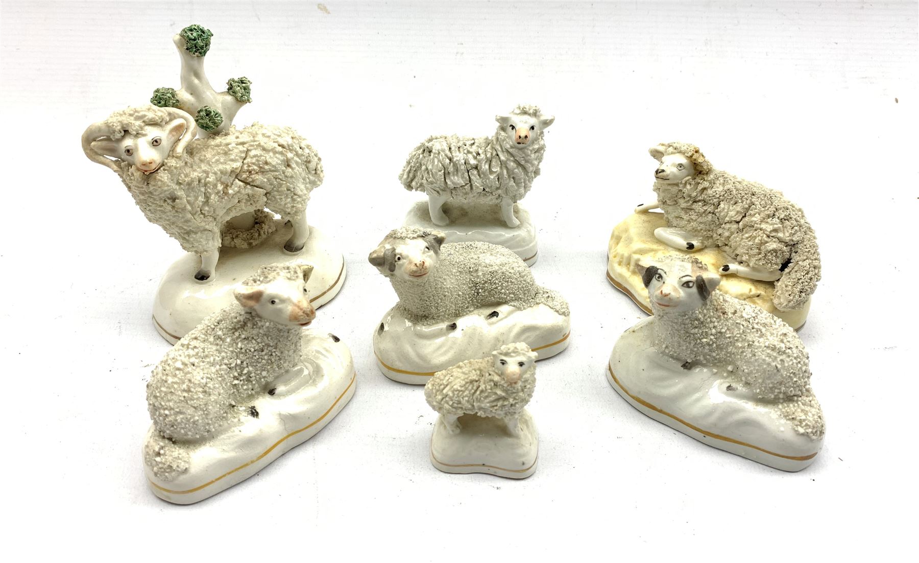 Group of 19th century Staffordshire Sheep models to include a pair