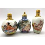 Three Chinese snuff bottles decorated with erotic scenes and blue character marks to base